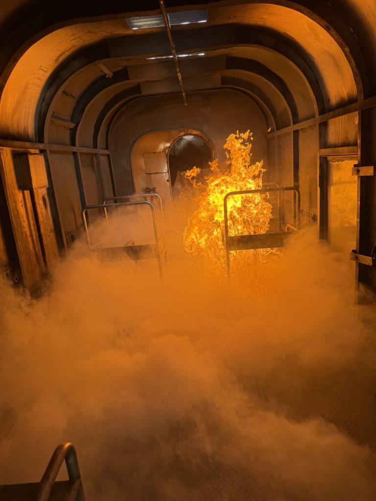 Fire and smoke inside an aircraft cabin fire trainer