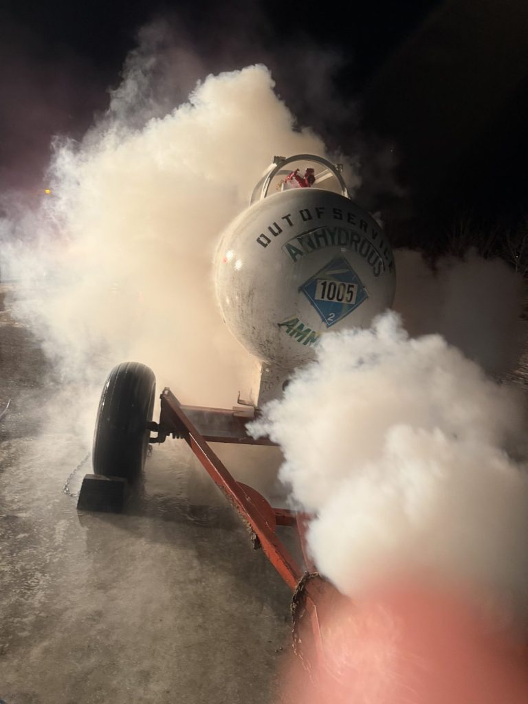 Ammonia nurse tank releasing a vapor cloud during a leak drill